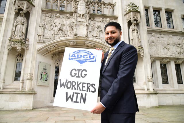 <p>Uber driver Yaseen Aslam outside the Supreme Court, London, on Friday after justices ruled that drivers should be classed as workers, not independent third-party contractors</p>