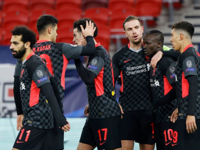 <p>Sadio Mane of Liverpool celebrates with teammates</p>