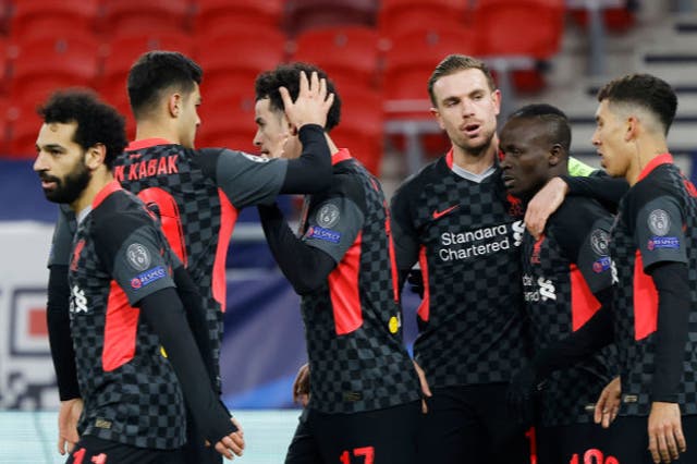 <p>Sadio Mane of Liverpool celebrates with teammates</p>