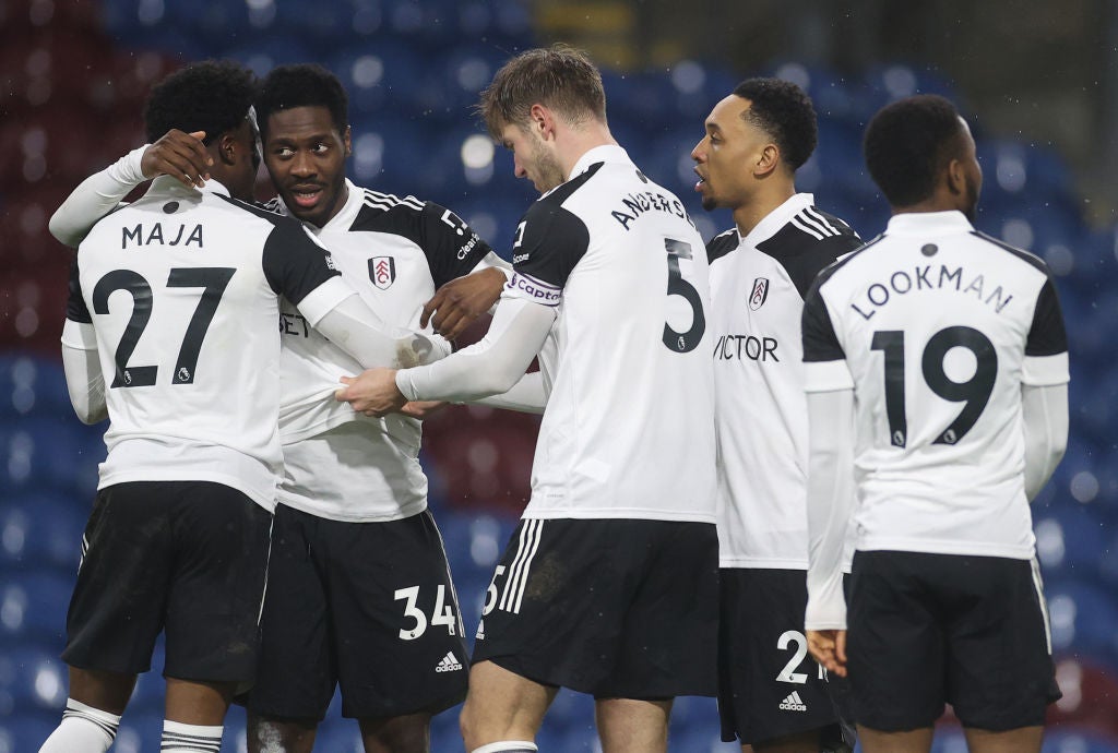 Ola Aina of Fulham celebrates with Josh Maja, Joachim Andersen and Kenny Tete