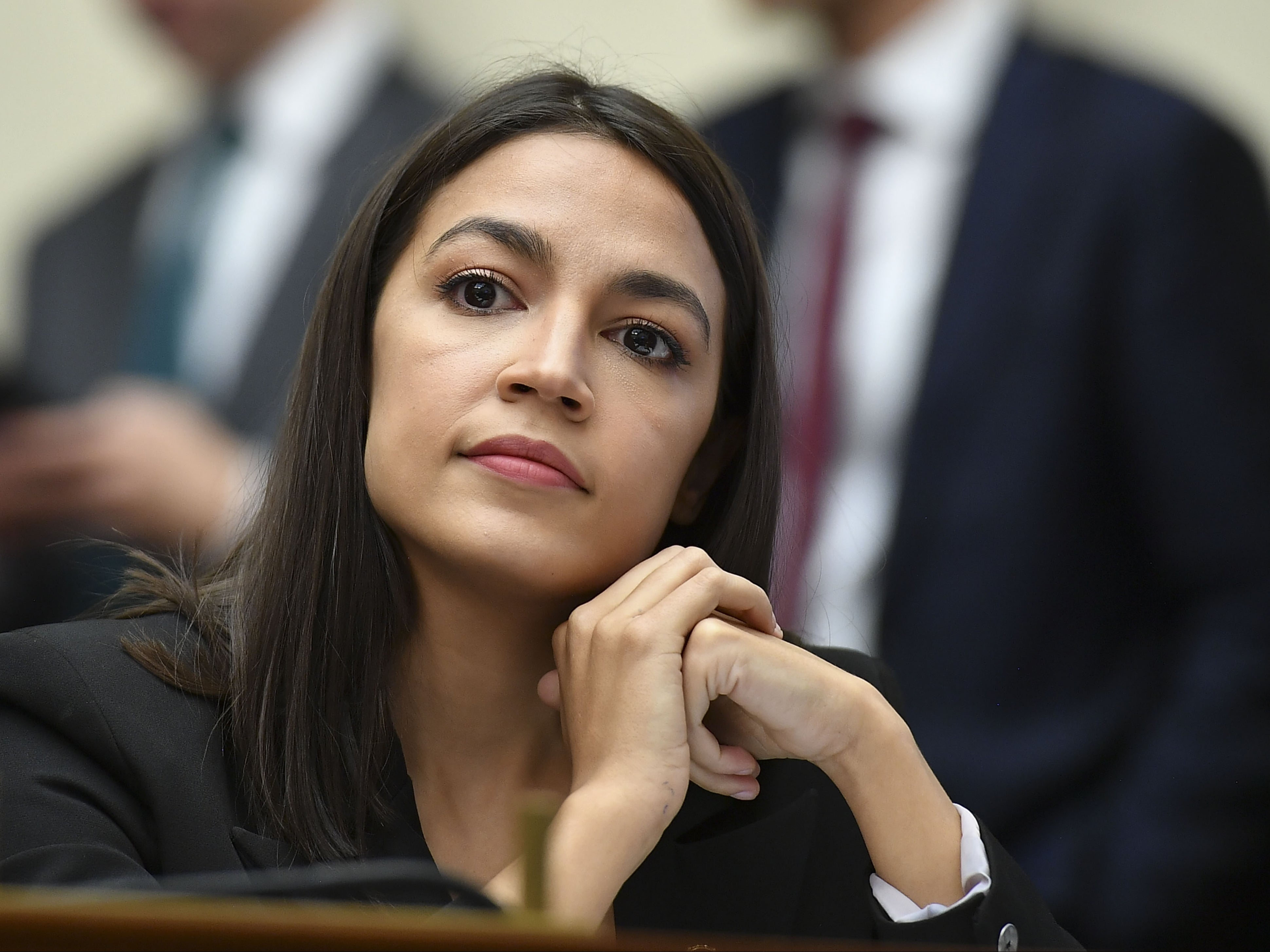 Rep. Alexandria Ocasio-Cortez implied that her Republican colleague, Marjorie Taylor Greene, was trying to cut her workday short.
