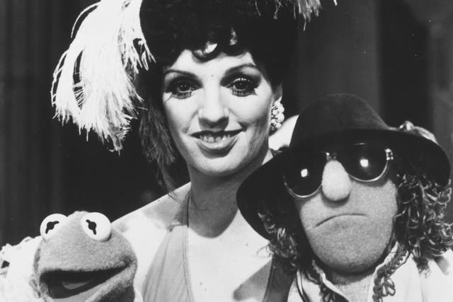 Liza Minnelli with muppets Kermit the Frog and Zoot on the set of The Muppet Show at Elstree Studios, London