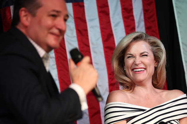 <p>Senator Ted Cruz (R-TX) speaks as his wife Heidi Cruz (R) looks on during a Women for Cruz rally on 3 November 2018 in Houston, Texas</p>