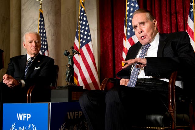<p>former Senate majority leader Bob Dole, right, speaks after being presented with the McGovern-Dole Leadership Award by then vice president Joe Biden, left, to honour his leadership in the fight against hunger, during the 12th Annual George McGovern Leadership Award Ceremony hosted by World Food Program USA, on Capitol Hill in Washington, DC</p>