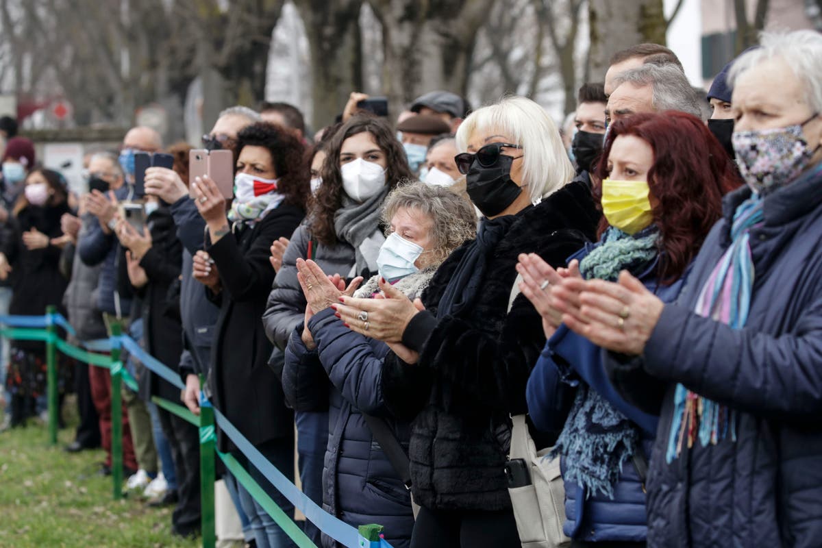 With heavy hearts, Italians mark year of COVID-19 outbreak