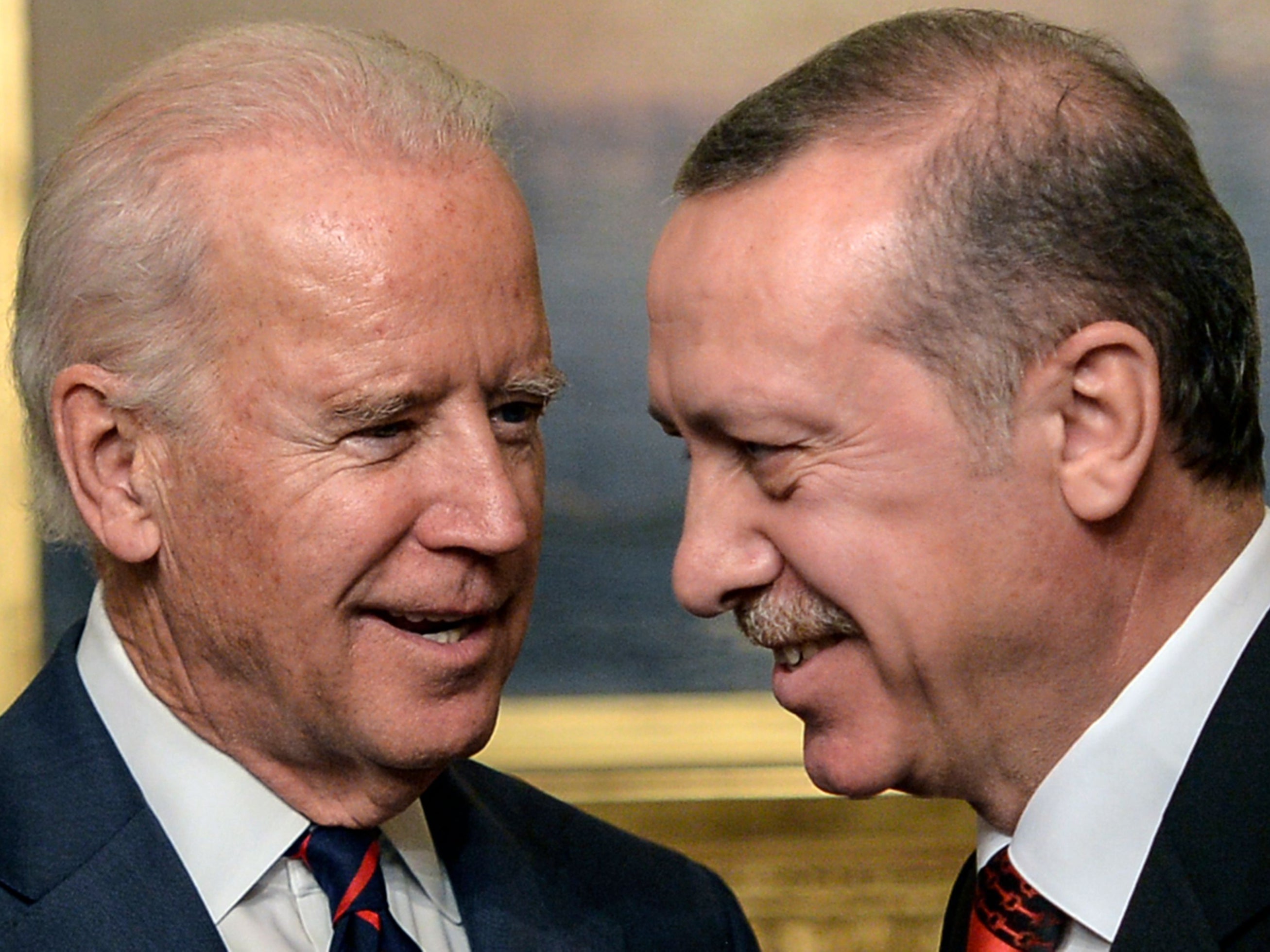 In this file photo taken on 22 November 2014, then US Vice President Joe Biden (L) speaks with Turkish President Recep Tayyip Erdogan at Beylerbeyi Palace in Istanbul