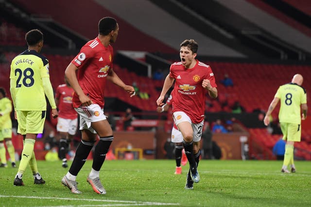 <p>Daniel James celebrates scoring United’s second</p>