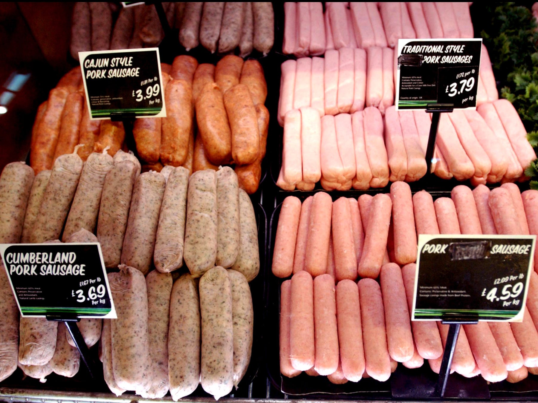 Sausages on display in a supermarket
