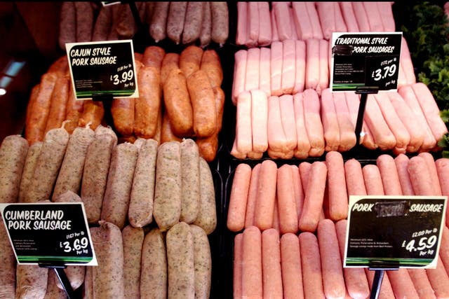 <p>Sausages on display in a supermarket</p>