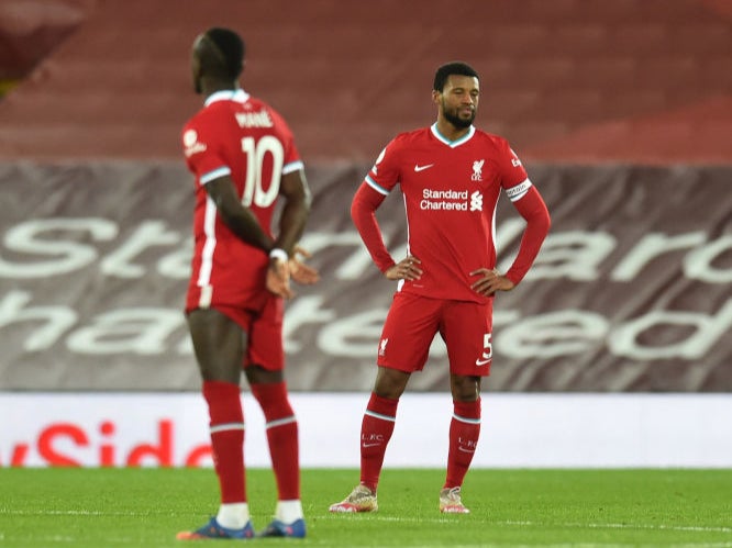 Liverpool’s players react during defeat by Everton