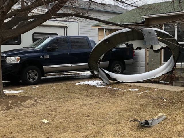 Insurance claim? A home in Broomfield, Colorado, with a large piece of debris from a Boeing 777 engine