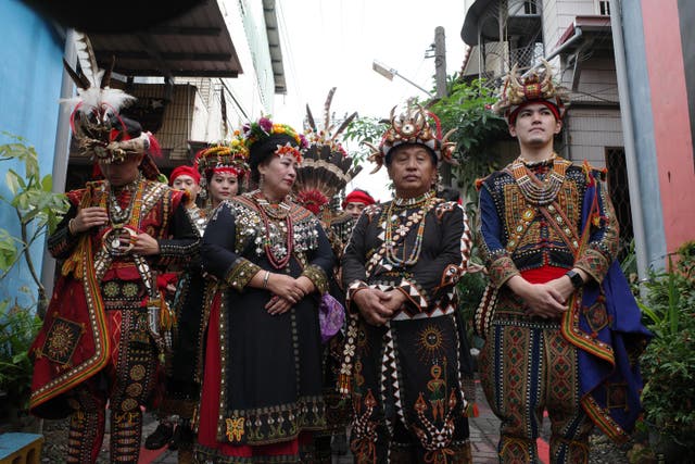 <p>Members of the Paiwan tribe attend a wedding ceremony in Pingtung, Taiwan, in December 2020</p>