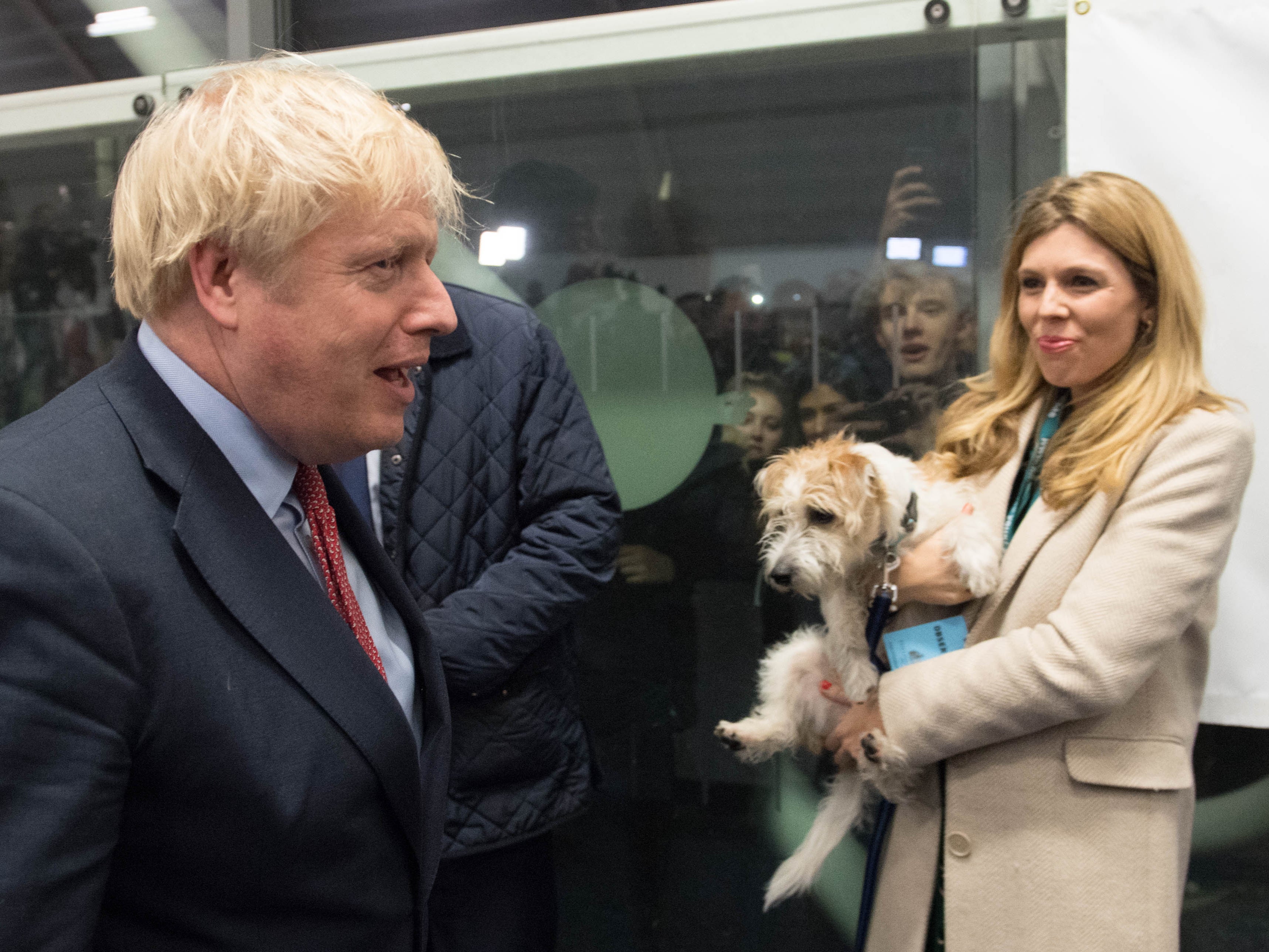 Boris Johnson with partner Carrie Symonds and dog Dilyn at the count in Johnson’s Uxbridge constituency during the 2019 general election