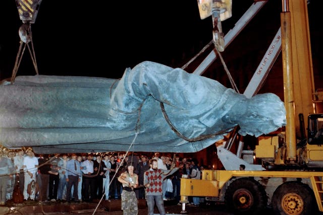 <p>The statue of Dzerzhinsky being removed in 1991</p>