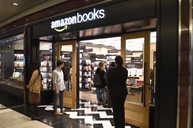 <p>Customers arrive at Amazon Books in Manhattan's Time Warner Center on May 25, 2017 as the online retailing giant Amazon.com Inc. opens its first New York City bookstore.</p>