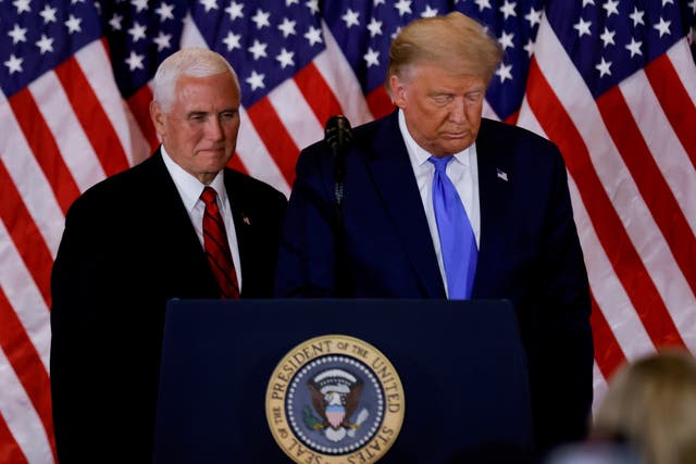 <p>File photo: US President Donald Trump and Vice President Mike Pence stand while making remarks about early results from the 2020 US presidential election</p>