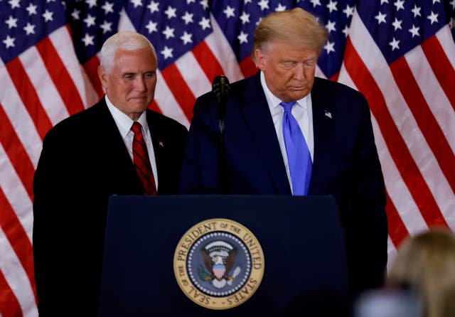 <p>File photo: US President Donald Trump and Vice President Mike Pence stand while making remarks about early results from the 2020 US presidential election</p>