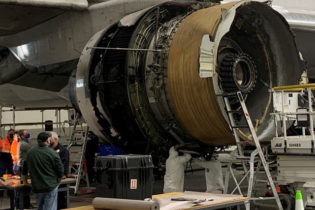 <p>The damaged starboard engine of United Airlines flight 328, a Boeing 777-200, is seen following a February 20 engine failure incident, in a hangar at Denver International Airport in Denver, Colorado, on 22 February 2021</p>