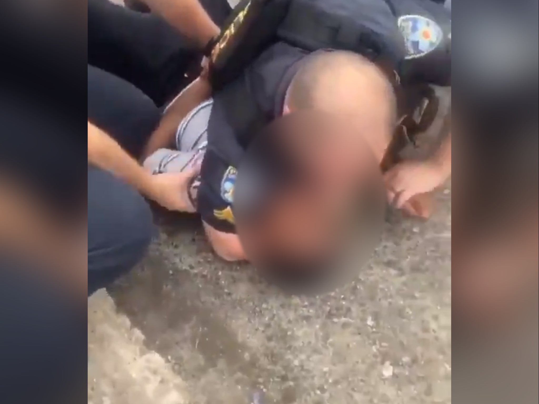 In footage that was widely shared following the incident, an officer can be seen restraining a boy on the ground before sitting him up and putting his hands behind his back