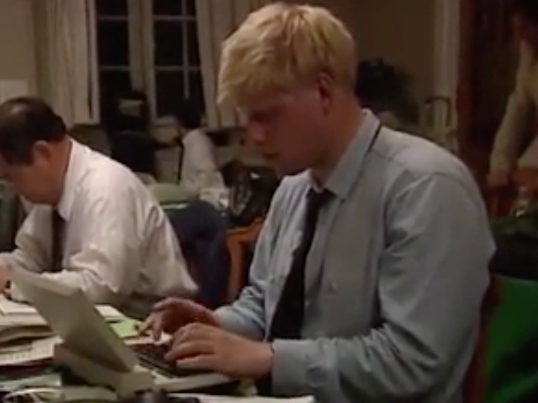 A hardworking Johnson, recognisable by his bright hair, is captured moments before he loses his temper