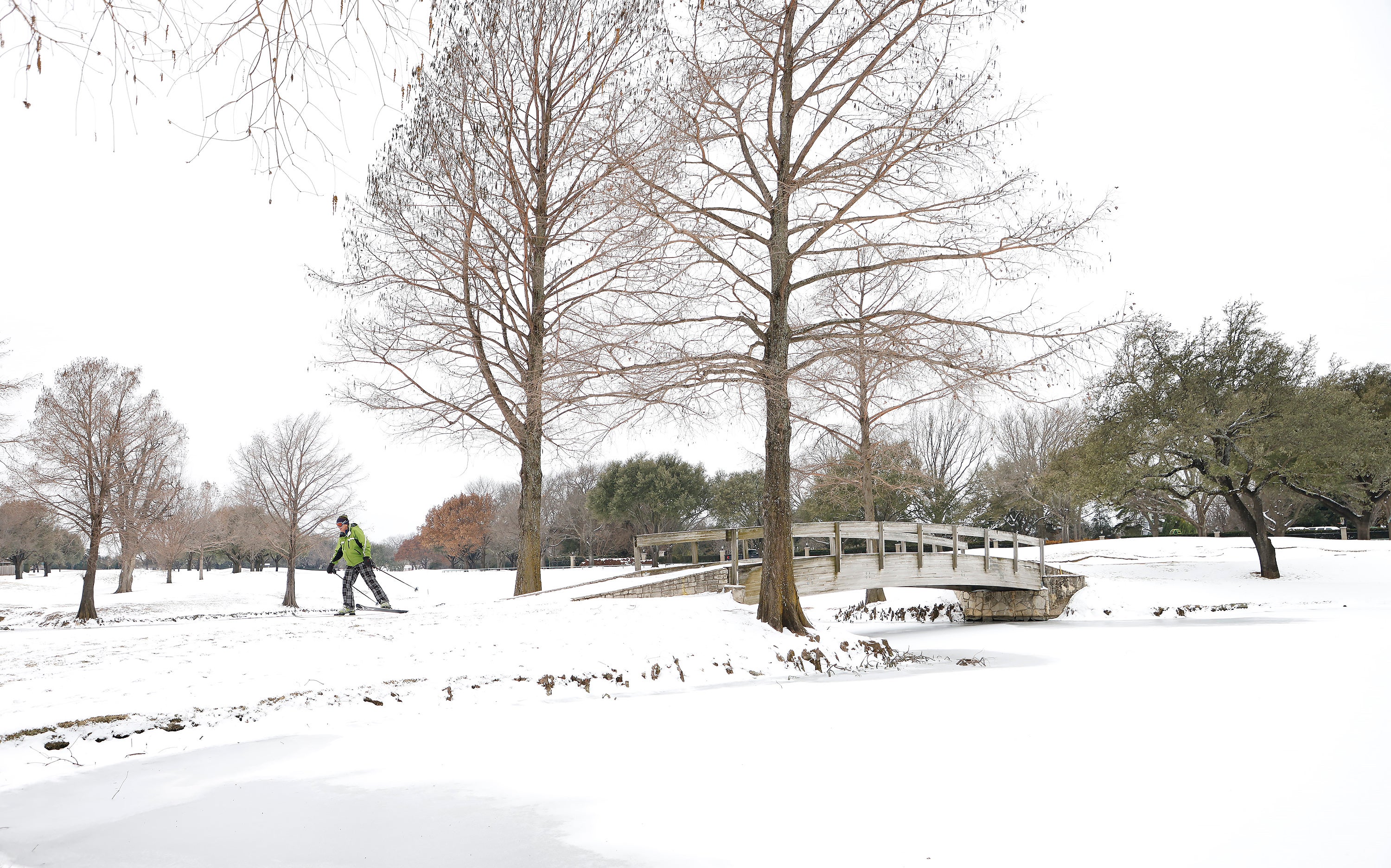 File image: A skier glides along a golf course in Fort Worth, Texas. Winter storm Uri has brought historic cold weather and power outages to the state