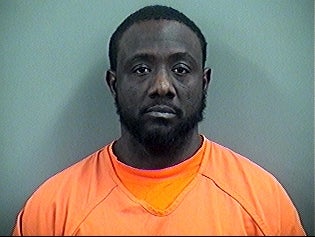 <p>Lawrence Anderson in police custody</p>