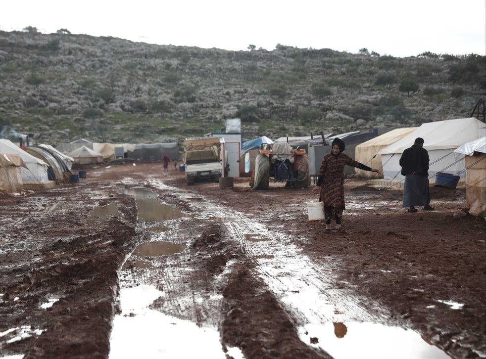 Syrian refugees in a camp near Kafr Aruq, in Idlib province