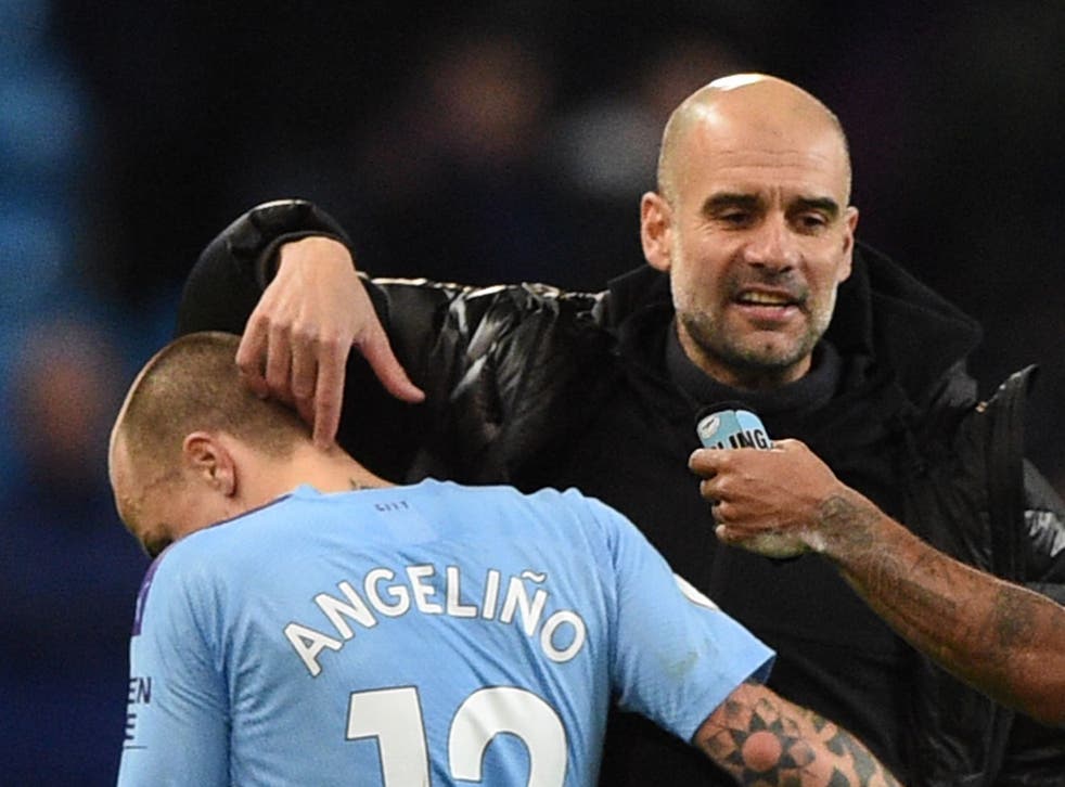 Manchester City manager Pep Guardiola and Angelino