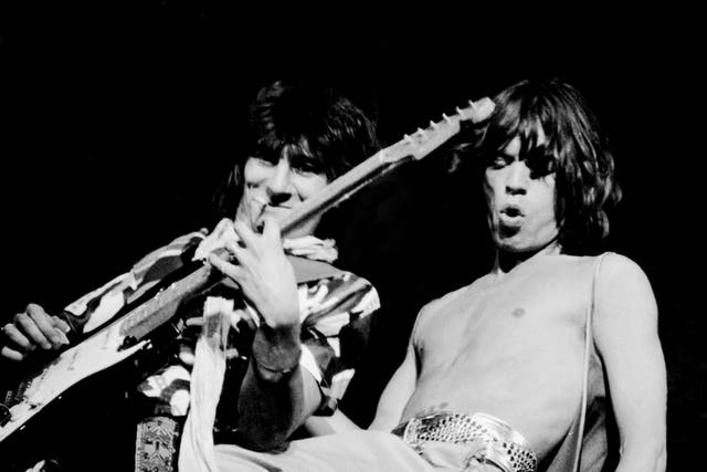 Rolling Stones guitarist Ron Wood and singer Mick Jagger performing at Knebworth in 1976. The Stones have been long-time fans of Fender’s Stratocaster guitars, which will no longer be made with ash due to climate change