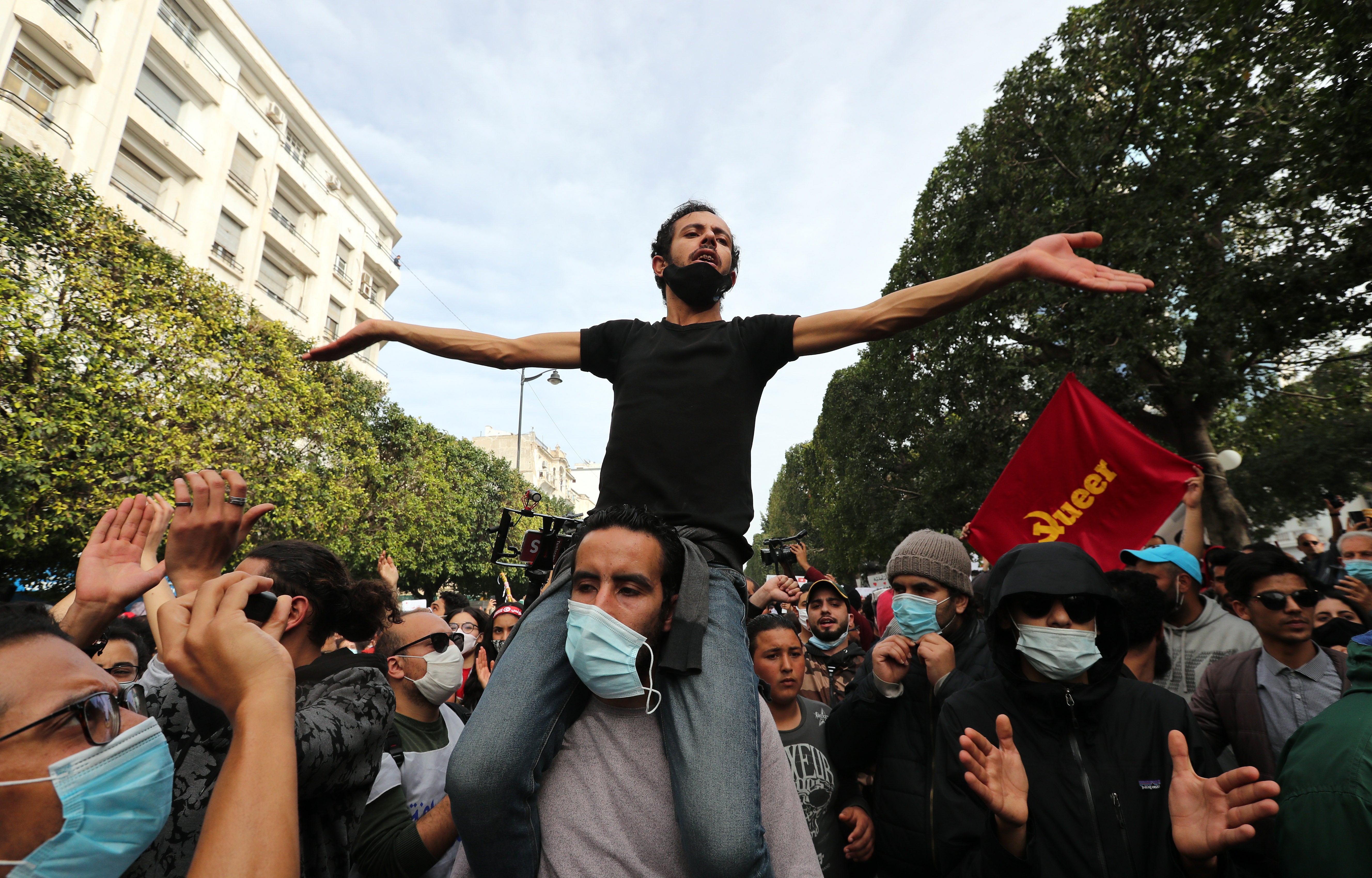 Tunisian anti-government protesters earlier this month on the streets of Tunis