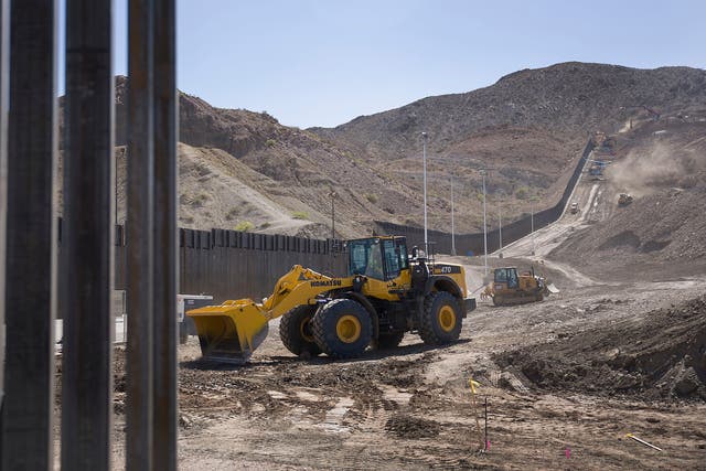 Construction crews work on a border wall being put in place by We Build The Wall Inc. on June 1, 2019 in Sunland Park, New Mexico