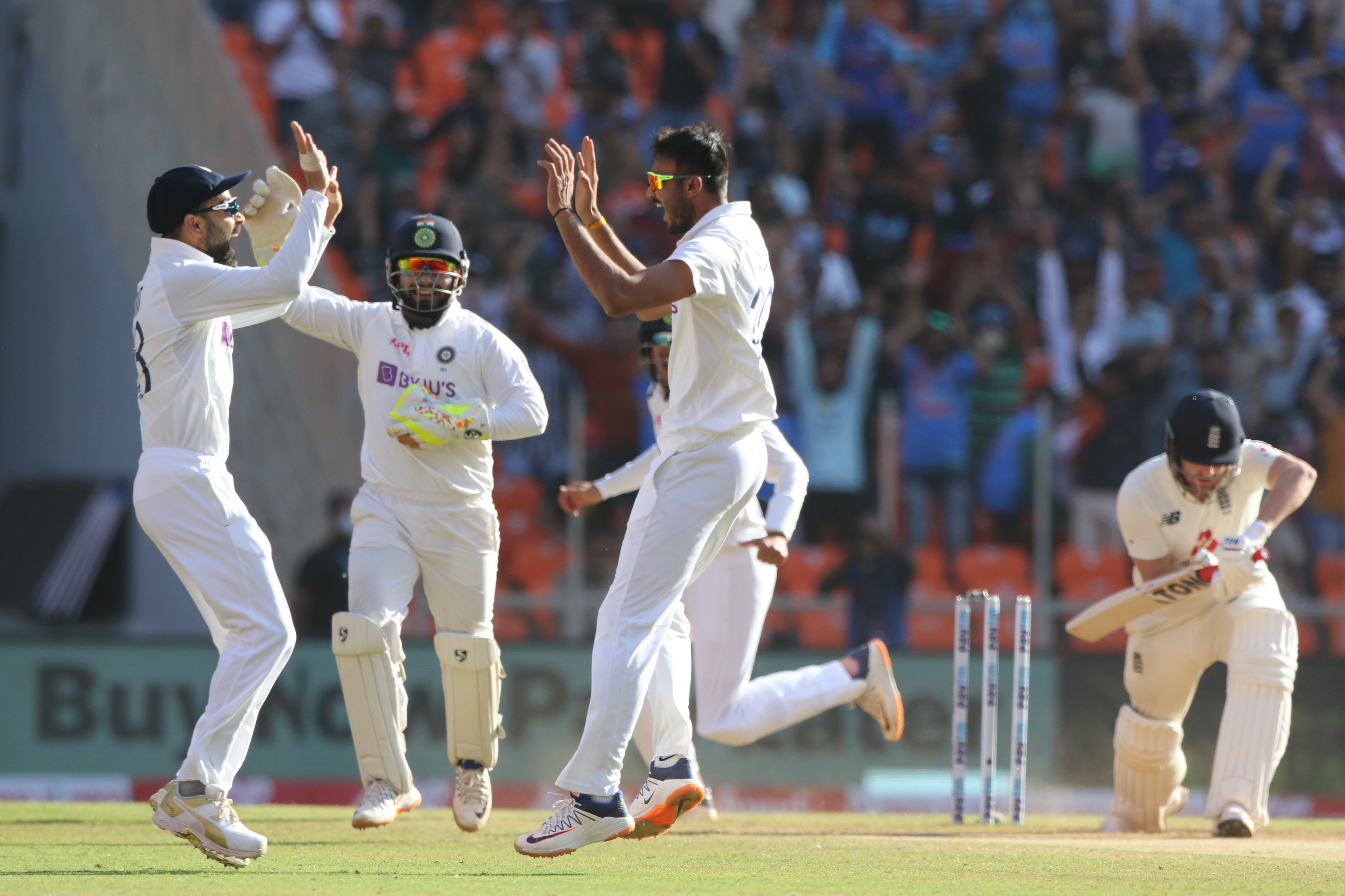 Axar Patel of India celebrates the wicket of Jonny Bairstow