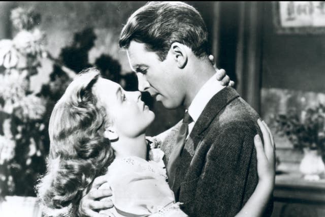 <p>Donna Reed and James Stewart in ‘It’s a Wonderful Life’</p>