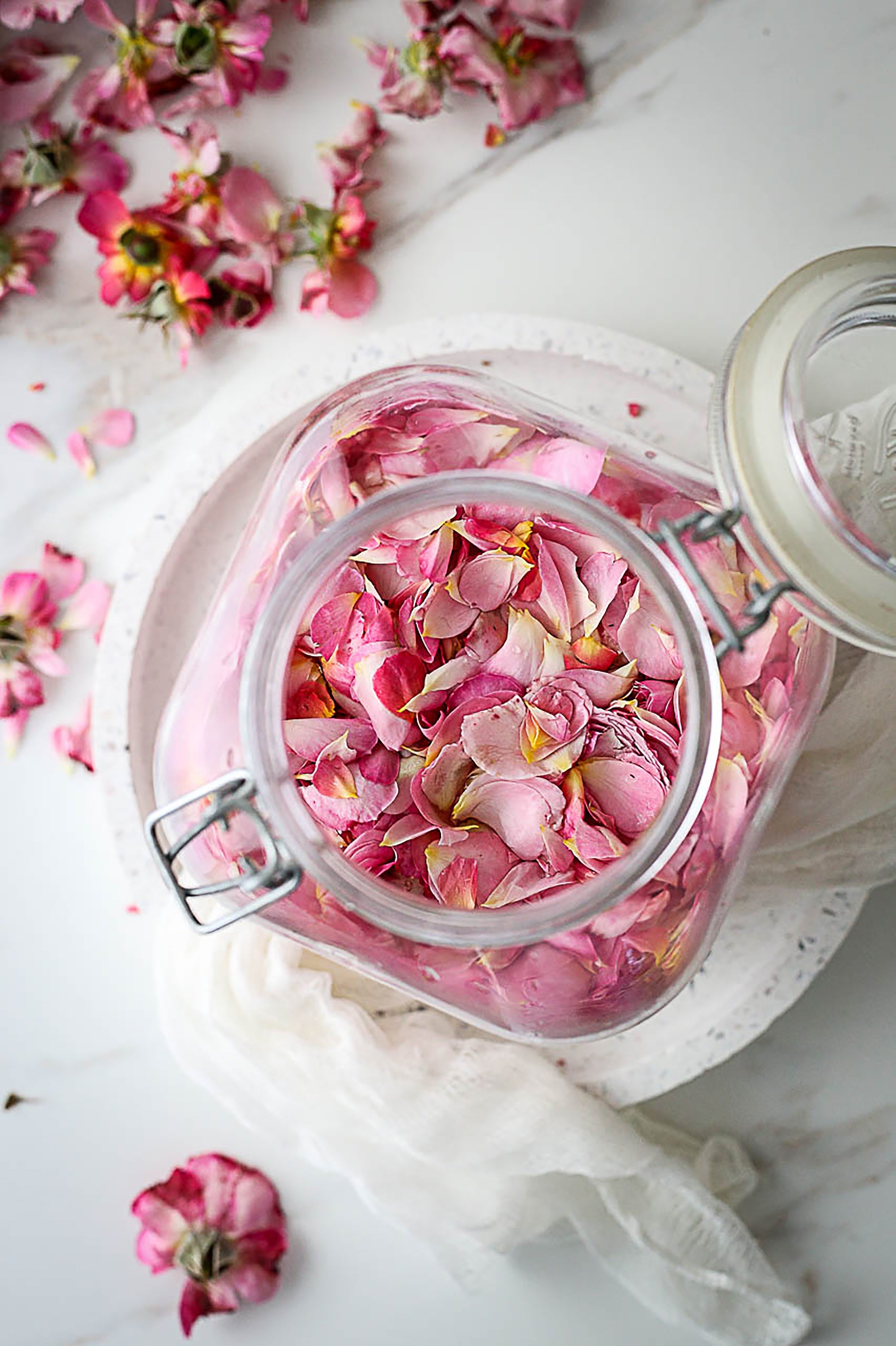 Pink rose petals in a jar (Milin Kuvar/PA)