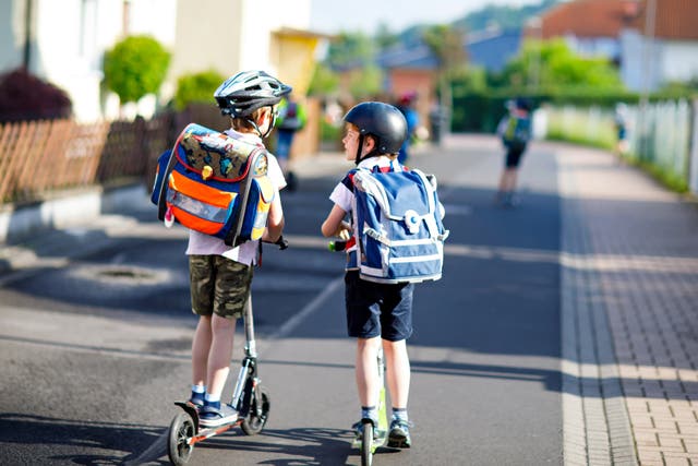 kids scootering to school