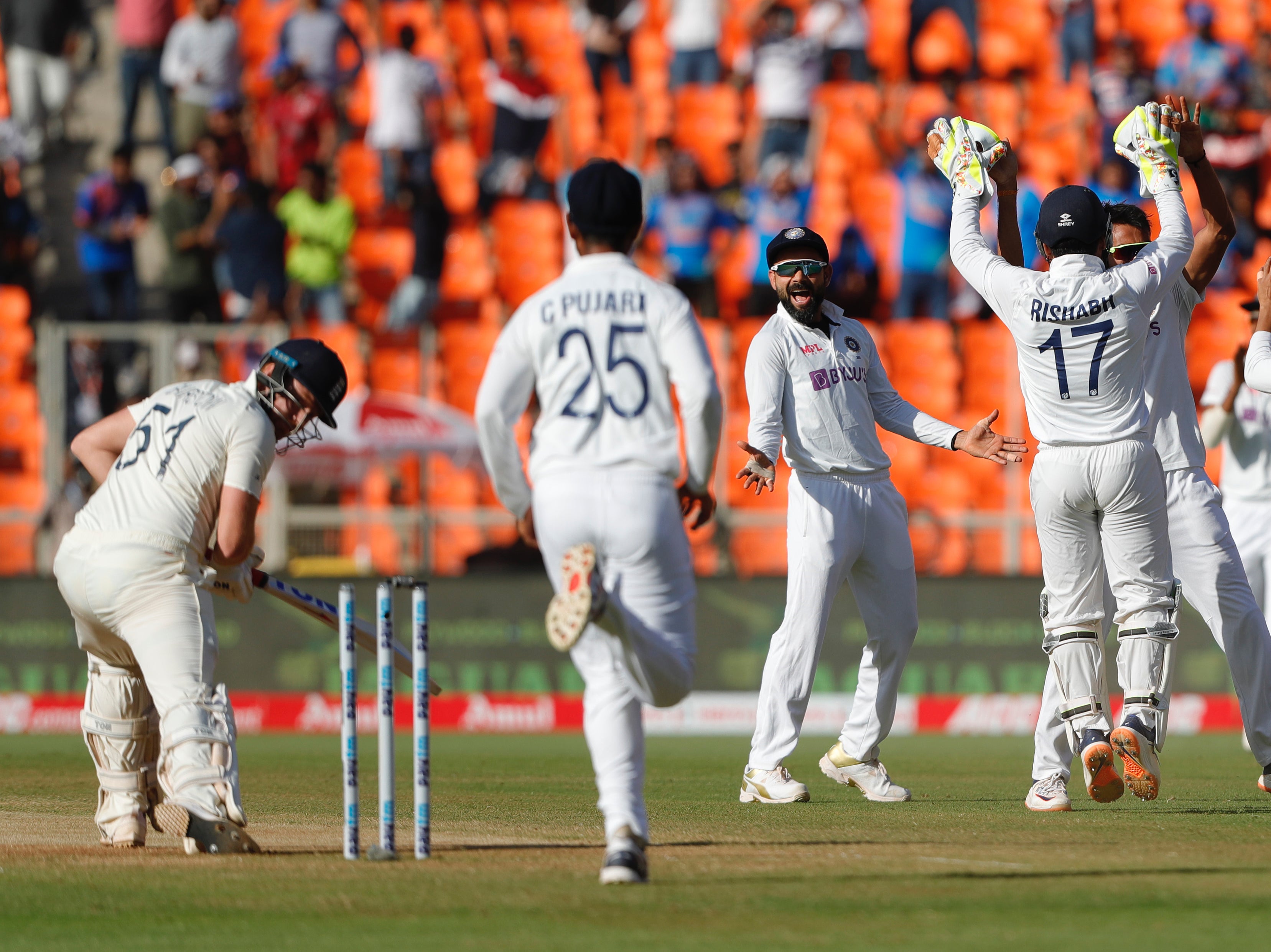 India celebrate the wicket of Jonny Bairstow