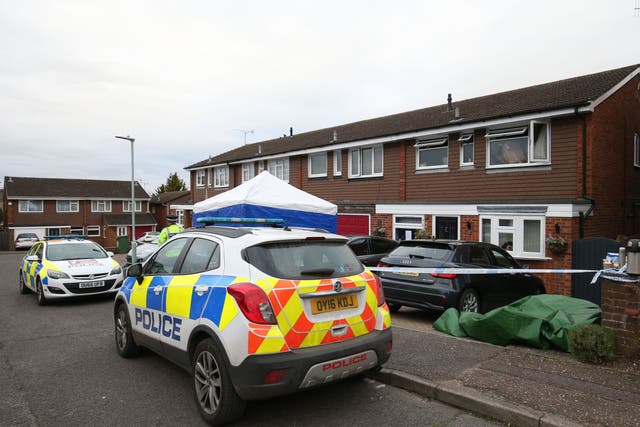 <p>Police outside the home of Gary Walker, his wife and their daughter in Stuarts Close, Hemel Hempstead, in March 2020</p>