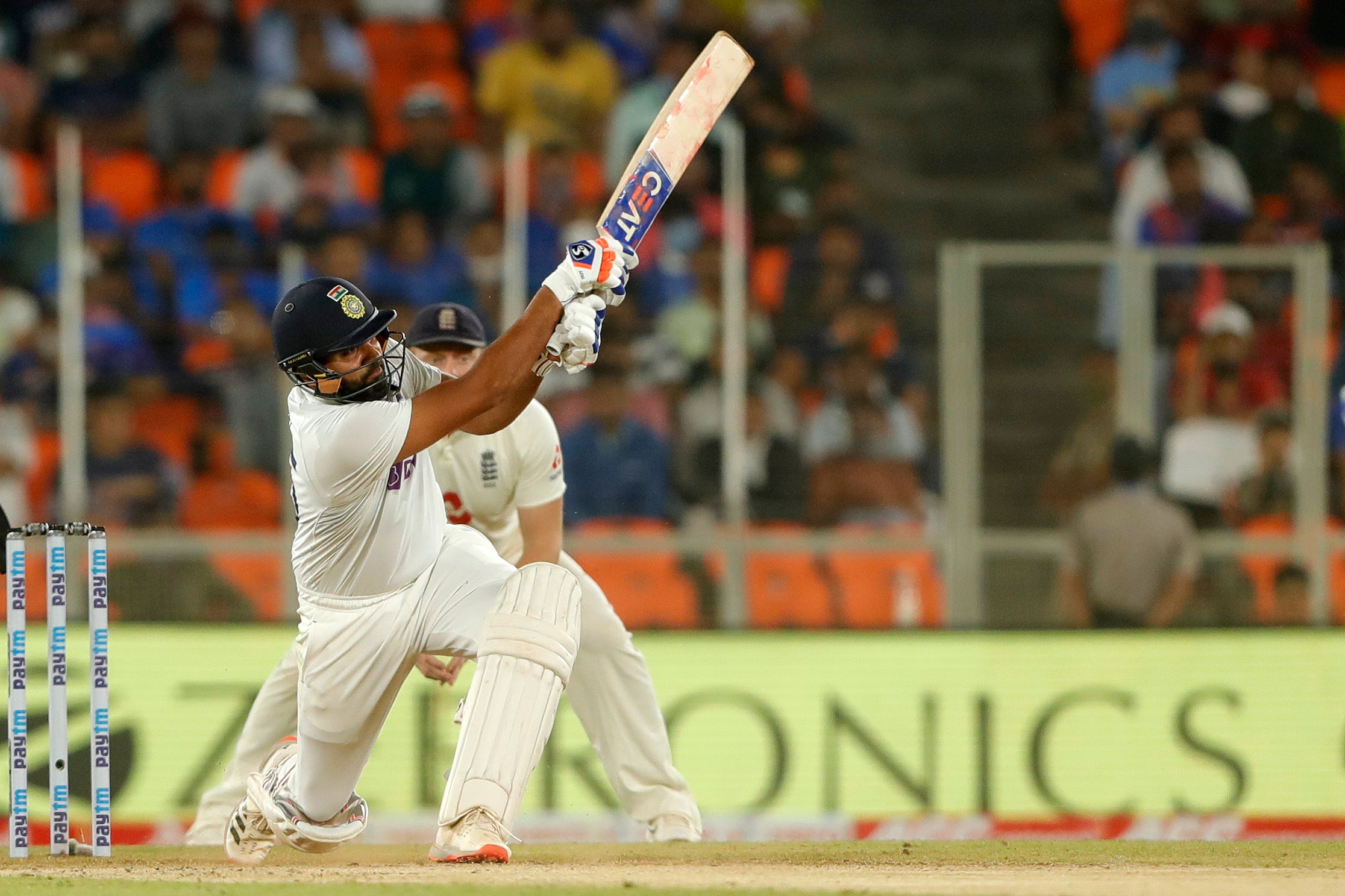 Rohit Sharma scoring a boundary on India’s route to victory