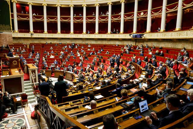 Politicians are shown in the French National Assembly in Paris on 9 February, 2021. 