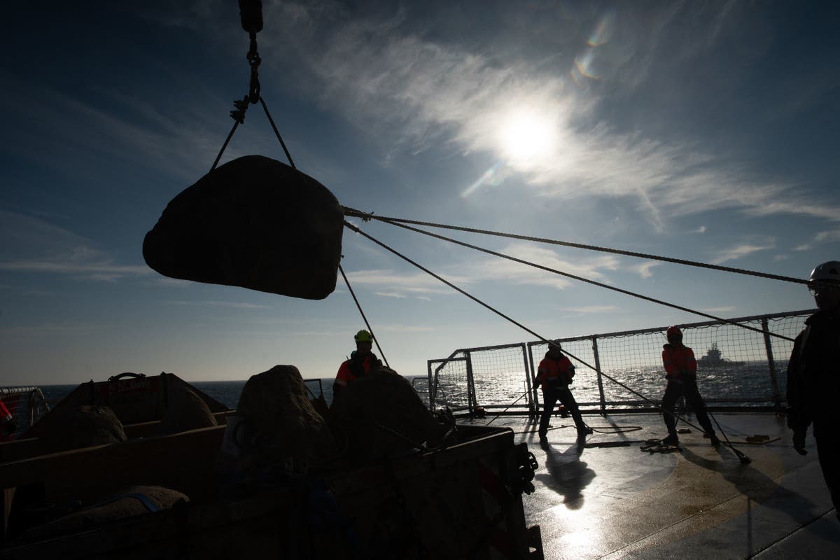 Greenpeace drop boulders into English Channel to disrupt fishing Greenpeace drop boulders into English Channel to disrupt fishing