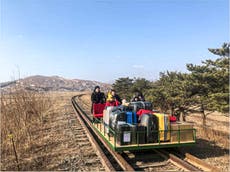 Russian diplomats hand push trolley over North Korea border
