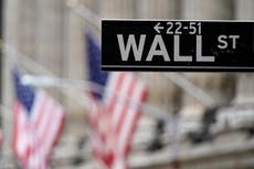 Dow Jones hits record high in stock rally as inflation fears fall and Congress passes $1.9 trn Covid relief bill