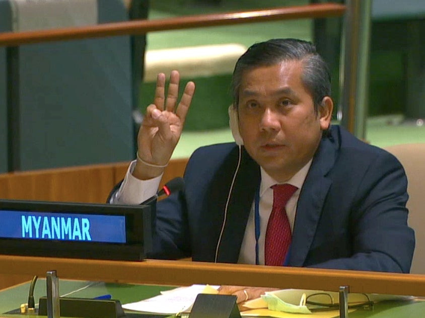 <p>Myanmar’s ambassador to the United Nations Kyaw Moe Tun holds up three fingers at the end of his address</p>
