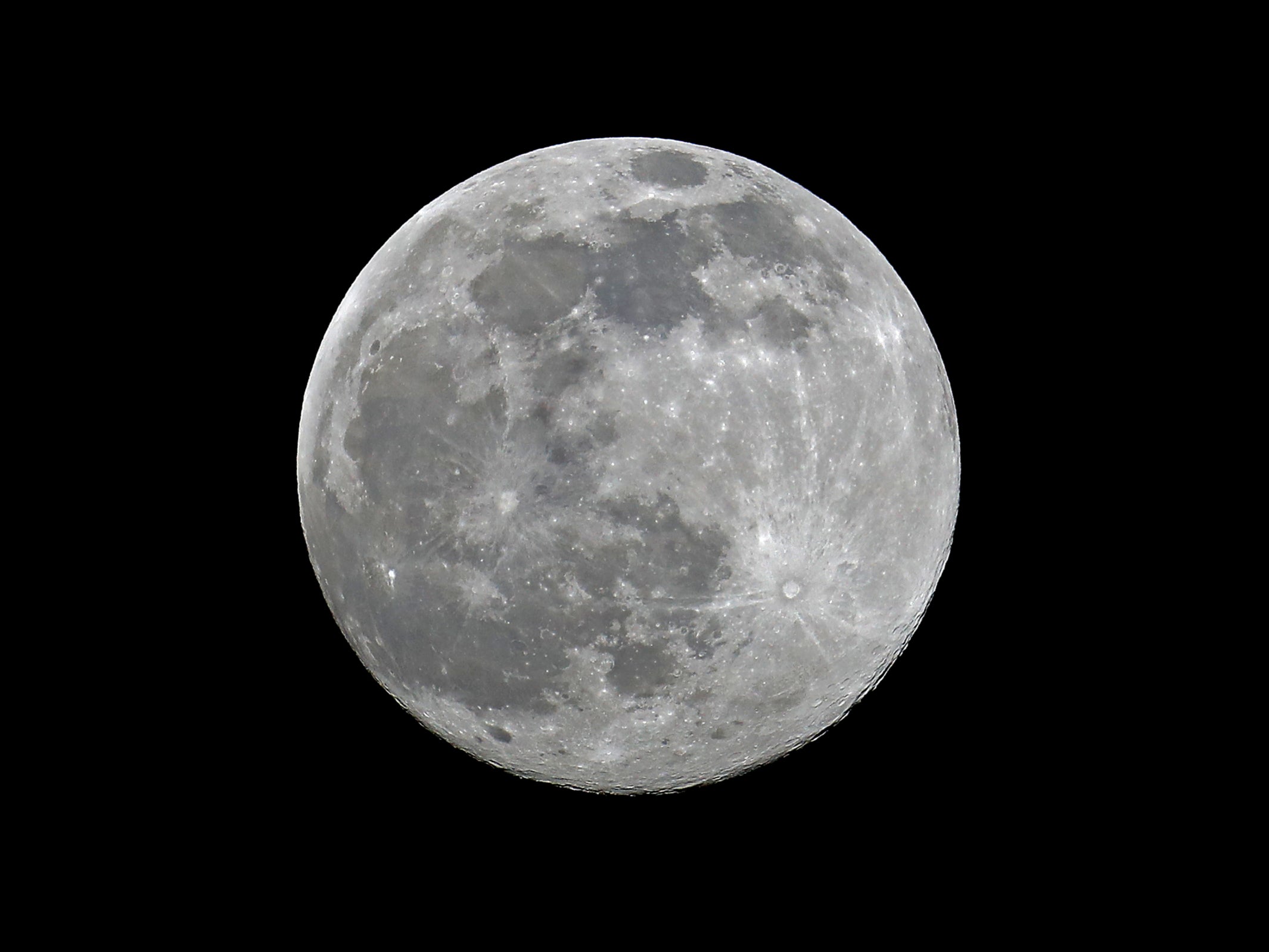The full moon in the night sky over London on 26 February
