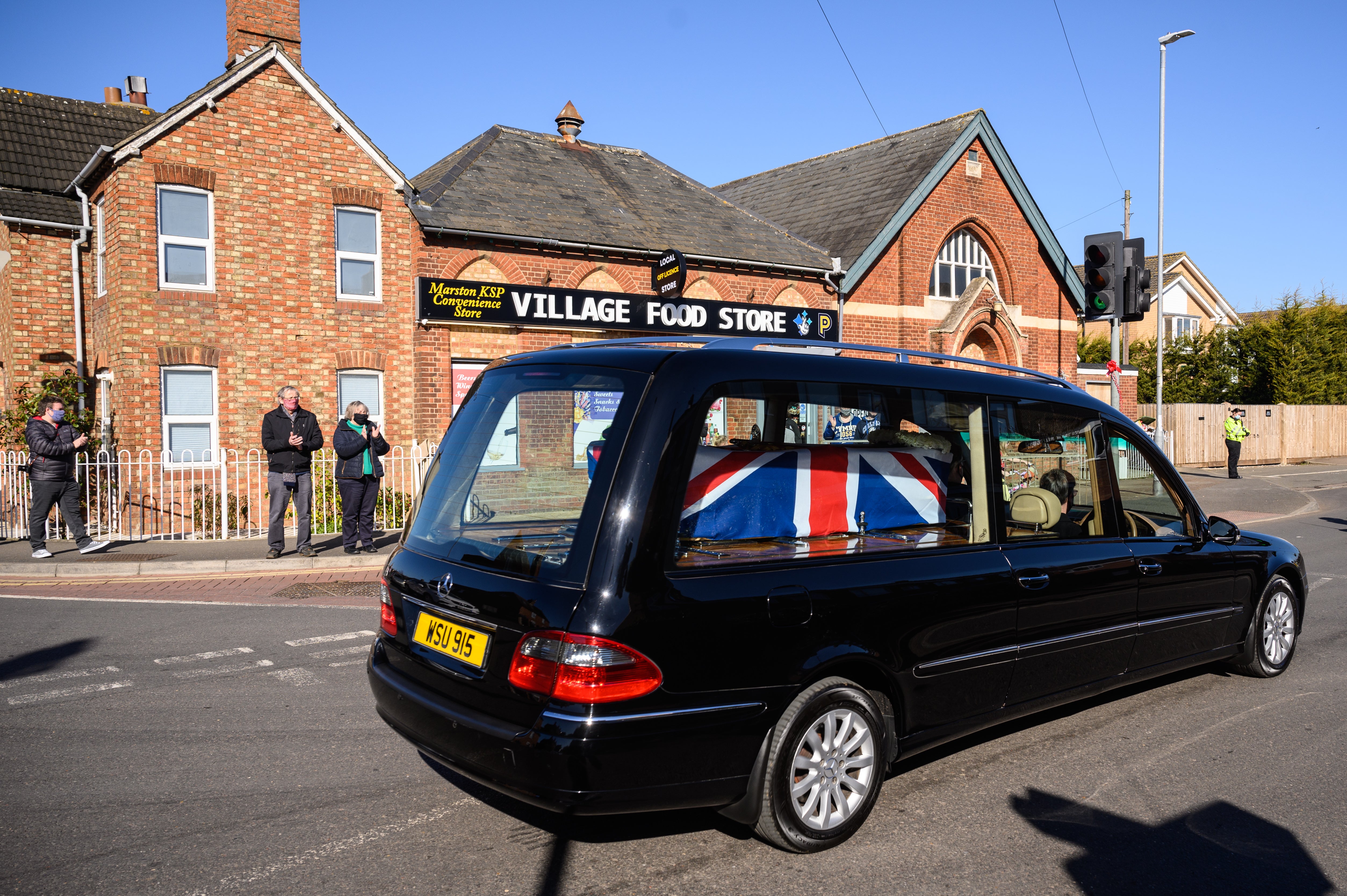 The coffin of Captain Tom was driven through Marston Moretaine on the way to his resting place