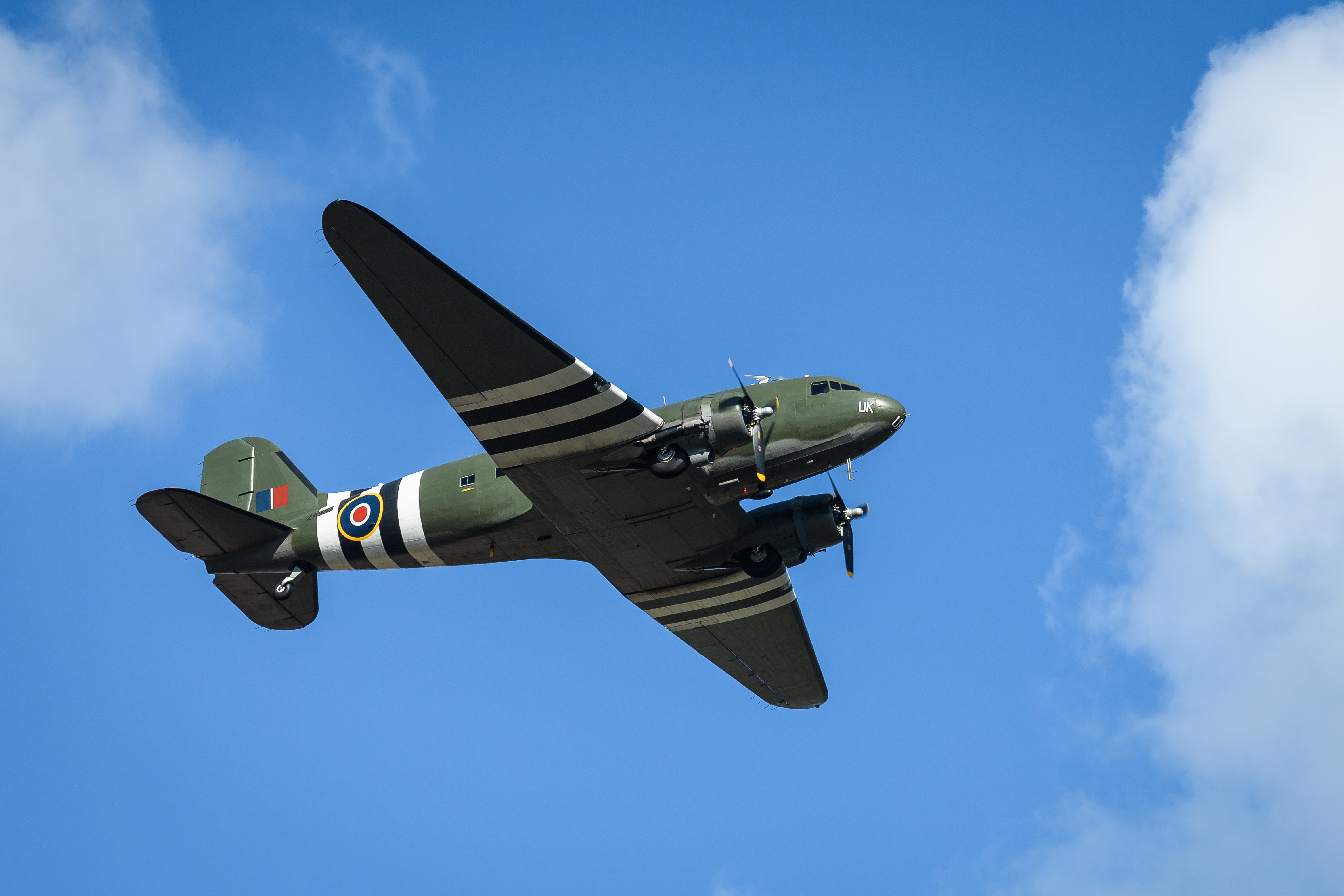 A vintage C-47 Dakota performs a flypast over Bedford crematorium