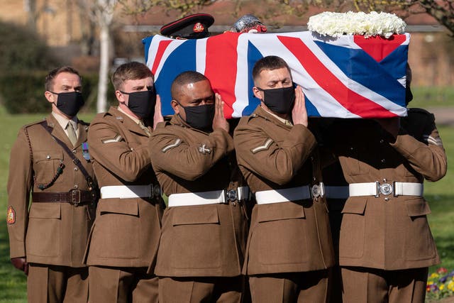 Soldiers from the British Army's Yorkshire Regiment carry the coffin