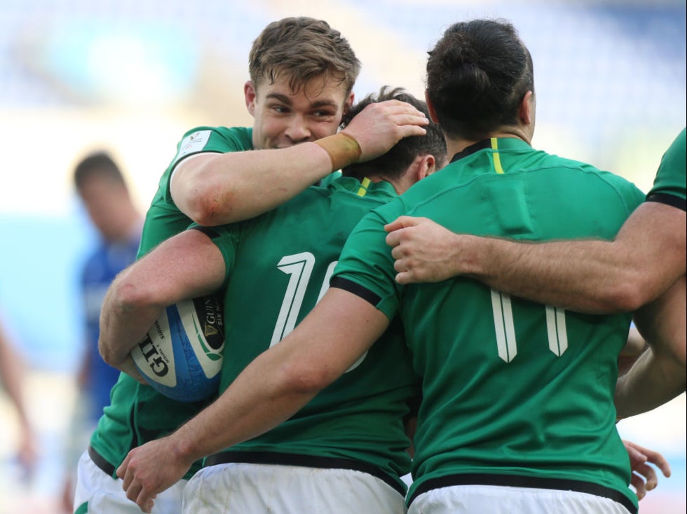 Hugo Keenan of Ireland is congratulated by teammates