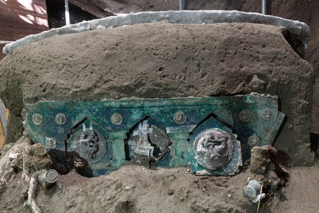 <p>The ceremonial chariot was uncovered in a porch at a Roman villa outside the walls of Pompeii</p>