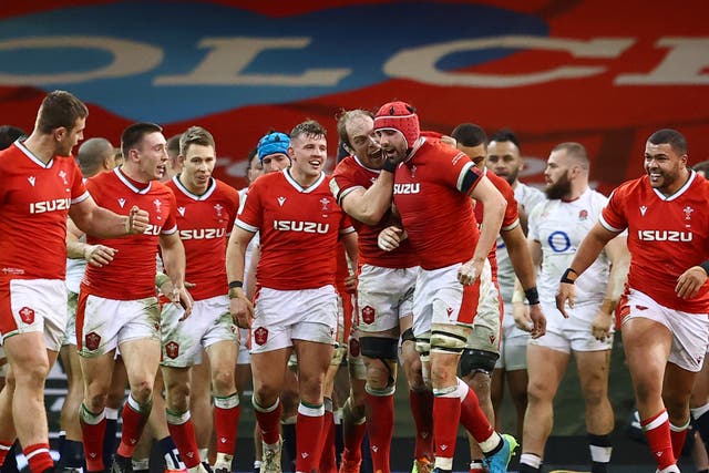 <p>Wales’ players celebrate victory</p>